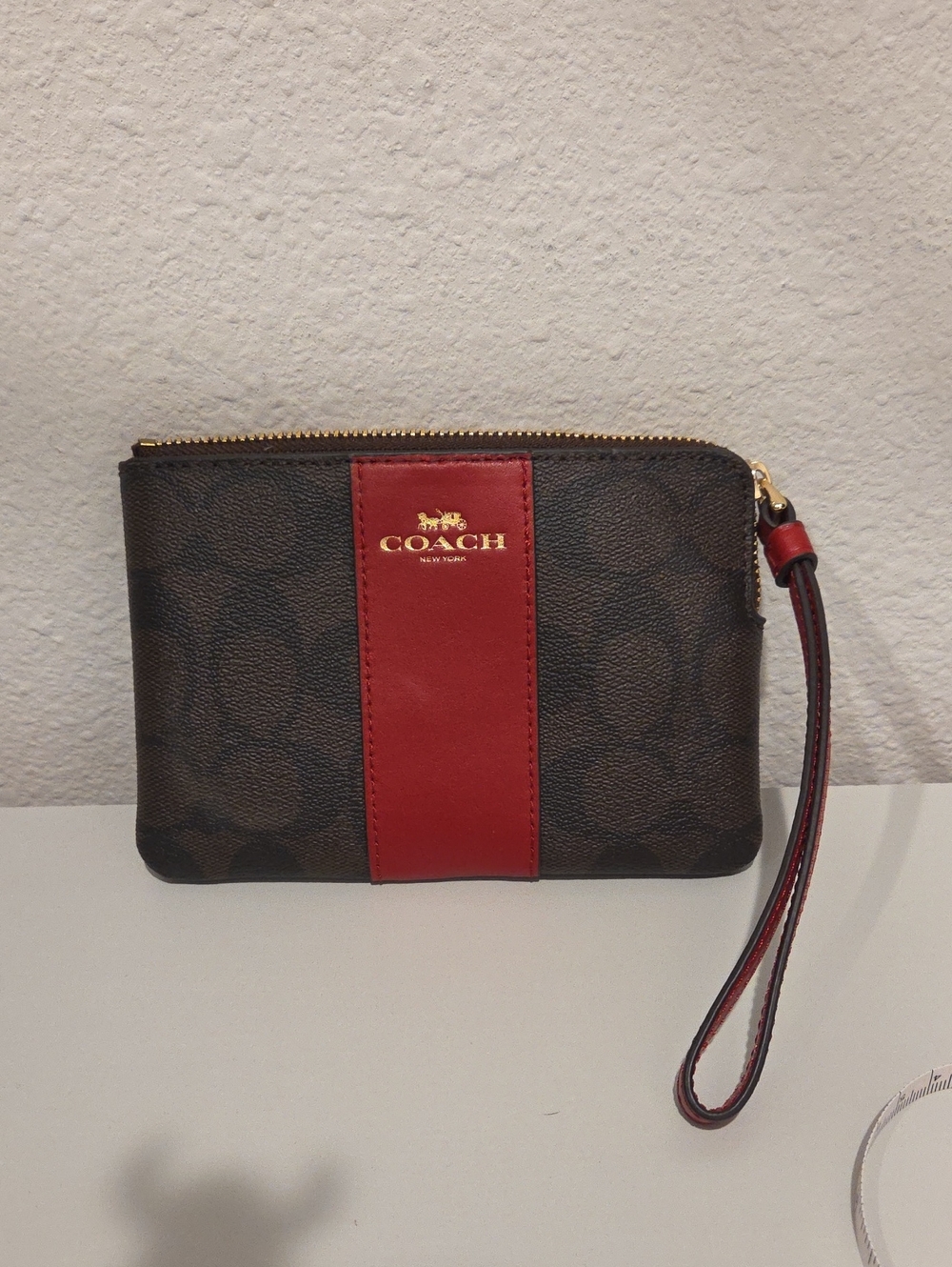 Coach Brown Signature Wristlet with Red Stripe